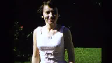 Moline Illinois USA (1962): Woman Garden Walking Man Front Of A House Standing
