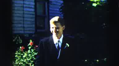 Moline Illinois USA (1962): A Man In Formal Attire Looks Happy Tidys Himself Up