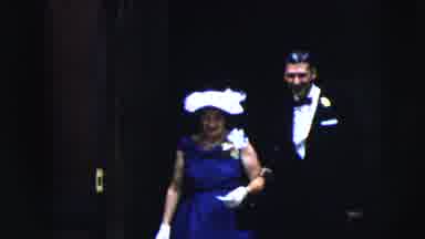 Moline Illinois USA (1962): Woman Wearing Blue Dress Holds Onto White Hat While