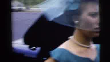 Moline Illinois USA (1962): People In Wedding Attire Are Standing In A Parking Lot