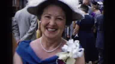 Moline Illinois USA (1962): Boy Wearing Grey Suit Holds Hand Of Woman Wearing Blue