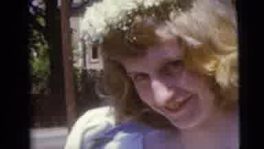 Moline Illinois USA (1962): Young Lady With Blonde Hair Smiles And Bats Her