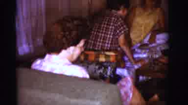 Clarkdale Arizona (1966): Woman Wearing White Dress Gets Comfortable In Grey Easy