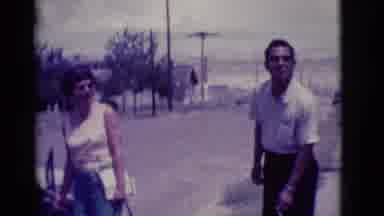 Clarkdale Arizona (1966): People Stand Outside An Open Car Waiting To Load It With
