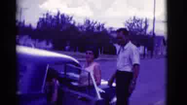 Clarkdale Arizona (1966): People Standing Near An Old Car With The Doors Open