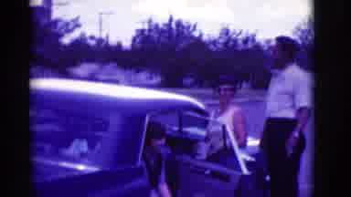 Clarkdale Arizona (1966): A Family Talking Around Their Vintage Car At Afternoon