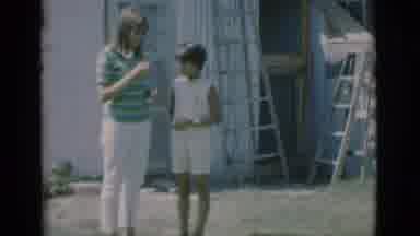 Clarkdale Arizona (1966): Three Women And A Child Stand Outside Beside A Garden