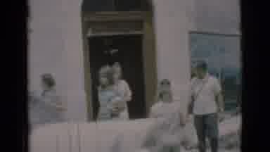 Clarkdale Arizona (1966): Family Waiting To Cross The Road While Traffic Drives By