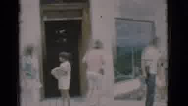 Clarkdale Arizona (1966): People Standing Outside Of A Town Shop While Others Walk
