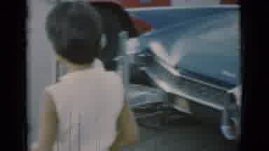 Clarkdale Arizona (1966): Women And Men Looking At Cars With Young Children In The