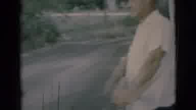 Clarkdale Arizona (1966): Old Man Watches Woman Get In To Blue Car Full Of