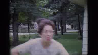 Clarkdale Arizona (1966): Lady In Dress Raking The Lawn And Checking The Mail