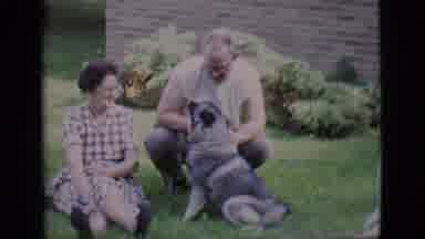Clarkdale Arizona (1966): Two Women Laying On The Grass While They Look At A Man