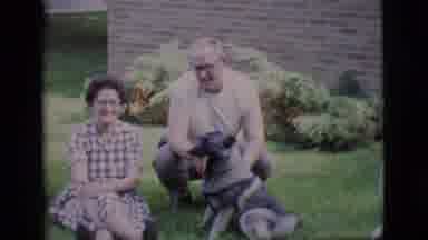 Clarkdale Arizona (1966): Two Women Are Laying On The Grass While A Man Plays With