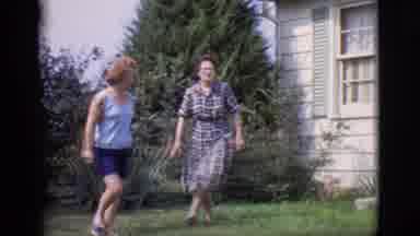 Clarkdale Arizona (1966): Couple With Friend Looking After Their Garden Watering