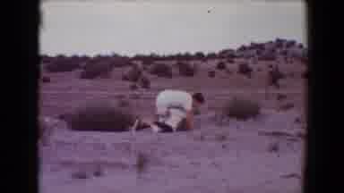 Flagstaff Arizona USA (1967): Boys Wrestling In Desert Surrounded By Small Brush