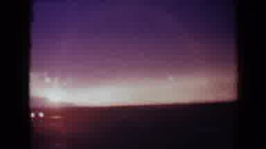Flagstaff Arizona USA (1967): Sunset Look Purple Pink And Orange As Cars Drive By