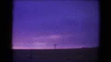 Flagstaff Arizona USA (1967): Sky In The Twilight While Car Passing By On The Road