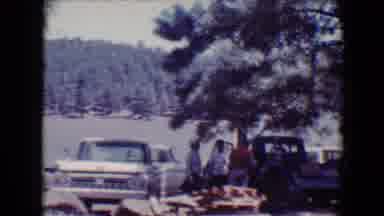 Flagstaff Arizona USA (1967): Cars And Truck Parked By A Lake And Men And Women