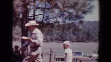 Flagstaff Arizona USA (1967): An Elderly Man Walks With A Plate Of Food Over To
