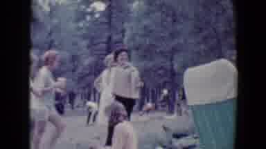 Flagstaff Arizona USA-1967: Family Picnic With Accordion Player And Children Playing Tug-of-War
