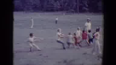 Flagstaff Arizona USA (1967): People Playing Tug Of War On Grass On A Clear Day