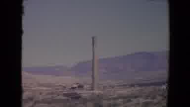 Flagstaff Arizona USA (1967): The View Of A Valley With Houses And Trees Under The