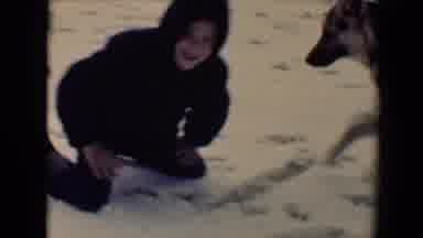 Flagstaff Arizona USA (1967): Boy Wearing Dark Blue Coat And Dog Play In Snow On A