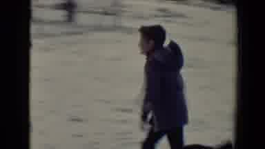 Flagstaff Arizona USA (1967): A Young Boy Runs Through The Snow And Tries To