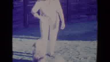 Tucson Arizona USA (1967): Woman Holding Up Treat To Entice Small Dog To Sit