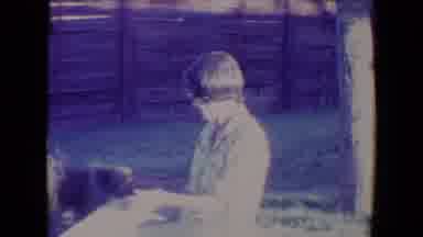 Tucson Arizona USA (1967): Old Women Plays With Her Dog During Live Football Game
