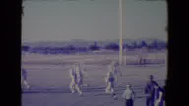 Tucson Arizona USA (1967): Group Of Football Players Running Down The Field On A
