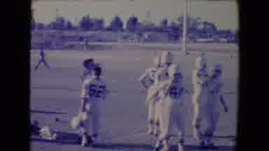 Tucson Arizona USA (1967): Football Players Milling About On A Football Field And