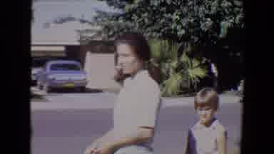 Tucson Arizona USA (1967): A Mother And Sun Outside Riding Bikes While Enjoying