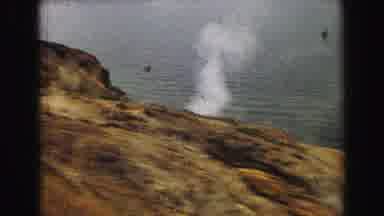 Yellowstone Wyoming USA (1967): Smoke Coming Out Of A Mountainside Near An Ocean