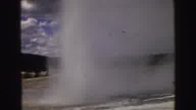 Yellowstone Wyoming USA (1967): A Geyser Shoots Up Water Into The Sky In The