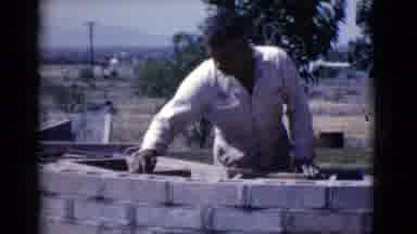 Cottonwood Arizona (1968): Man Building A Brick Wall