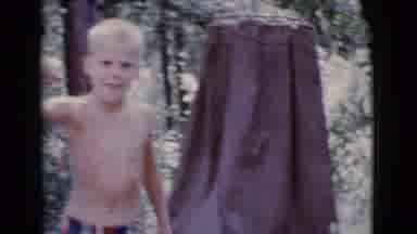 Cottonwood Arizona (1968): Child Walking With A Fish On A Fishing Line While