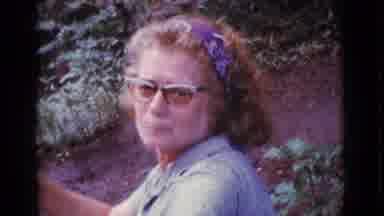 Cottonwood Arizona (1968): Woman In Sunglasses Smiles As A Child Passes Her A