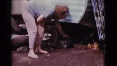 Cottonwood Arizona (1968): Old Woman Smoking And Storing A Suitcase Under The