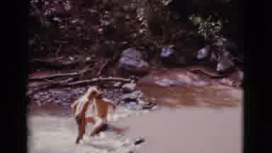 Cottonwood Arizona (1968): Boys Play In The River With Calm Waters And Unspoiled