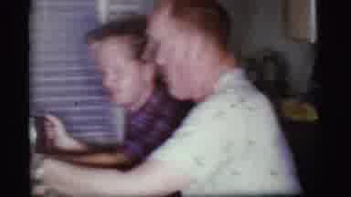 Cottonwood Arizona (1968): A Man In A White Shirts Eating Food As Another Man