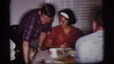 Cottonwood Arizona (1968): Man Petting A Dog Next To A Dinner Table With Other