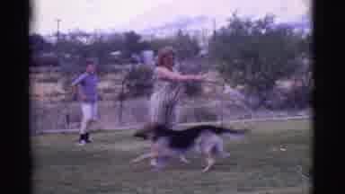 Cottonwood Arizona (1968): A Woman Holding A Water Hose And Two Young Boys