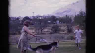 Cottonwood Arizona (1968): Mom Plays With Dog Using Water Hose
