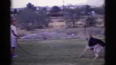 Cottonwood Arizona (1968): Young Boy Spraying Water Out Of A Garden Hose So His