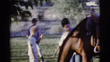 Cottonwood Arizona (1968): Woman Expertly Putting A Saddle And Other Tack On A