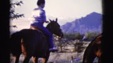 Cottonwood Arizona (1968): A Boy Trots Around On A Horse In A Fenced Area With