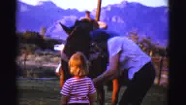 Cottonwood Arizona (1968): Little Girl Approaching A Horse With The Help Of Her