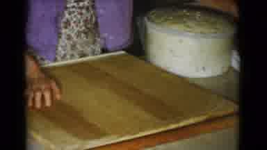 Cottonwood Arizona (1968): Old Home Movie Old Lady Putting Flour On Board A Cake